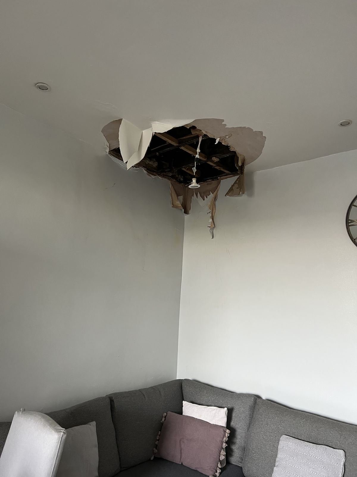 Before: hole in the living room ceiling