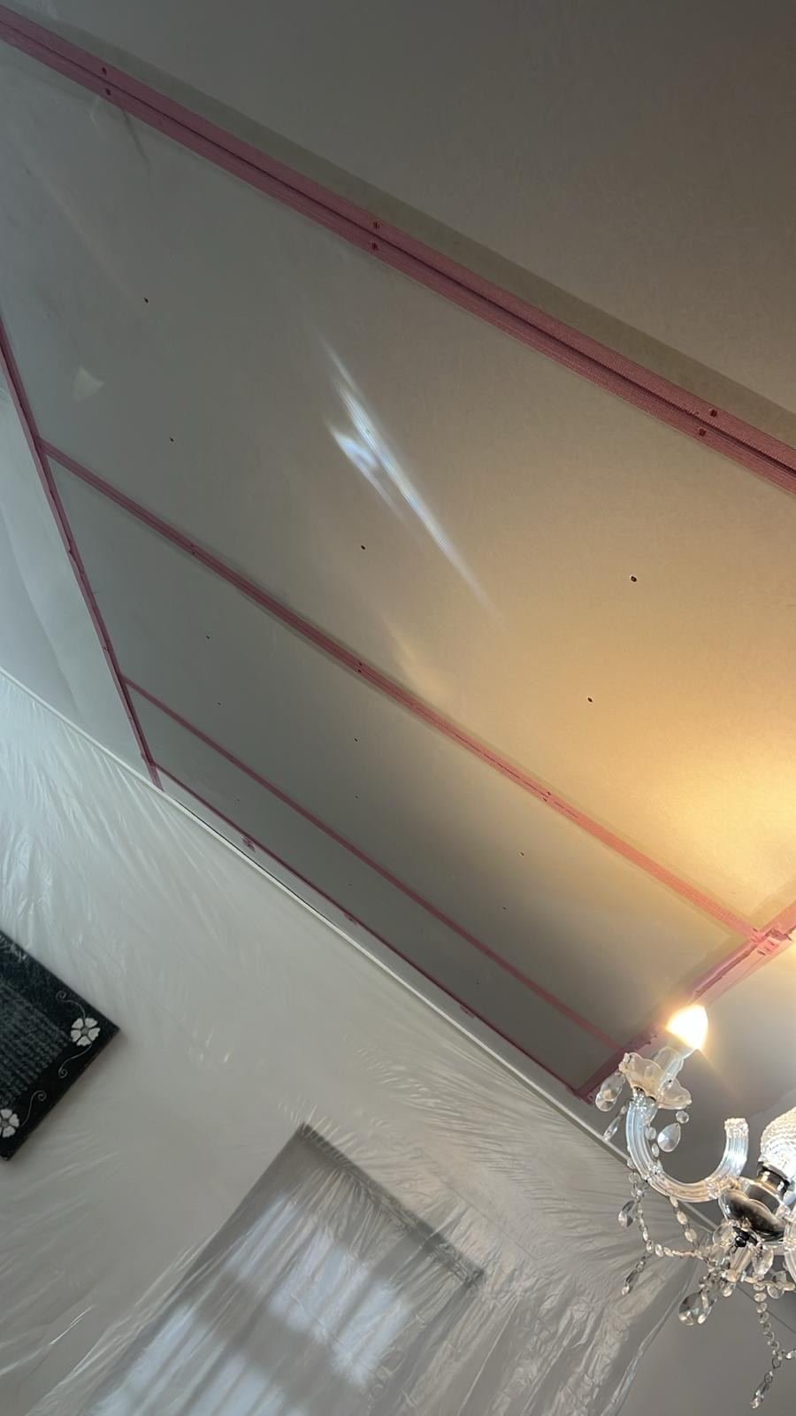 New ceiling with edges masked, ready to decorate