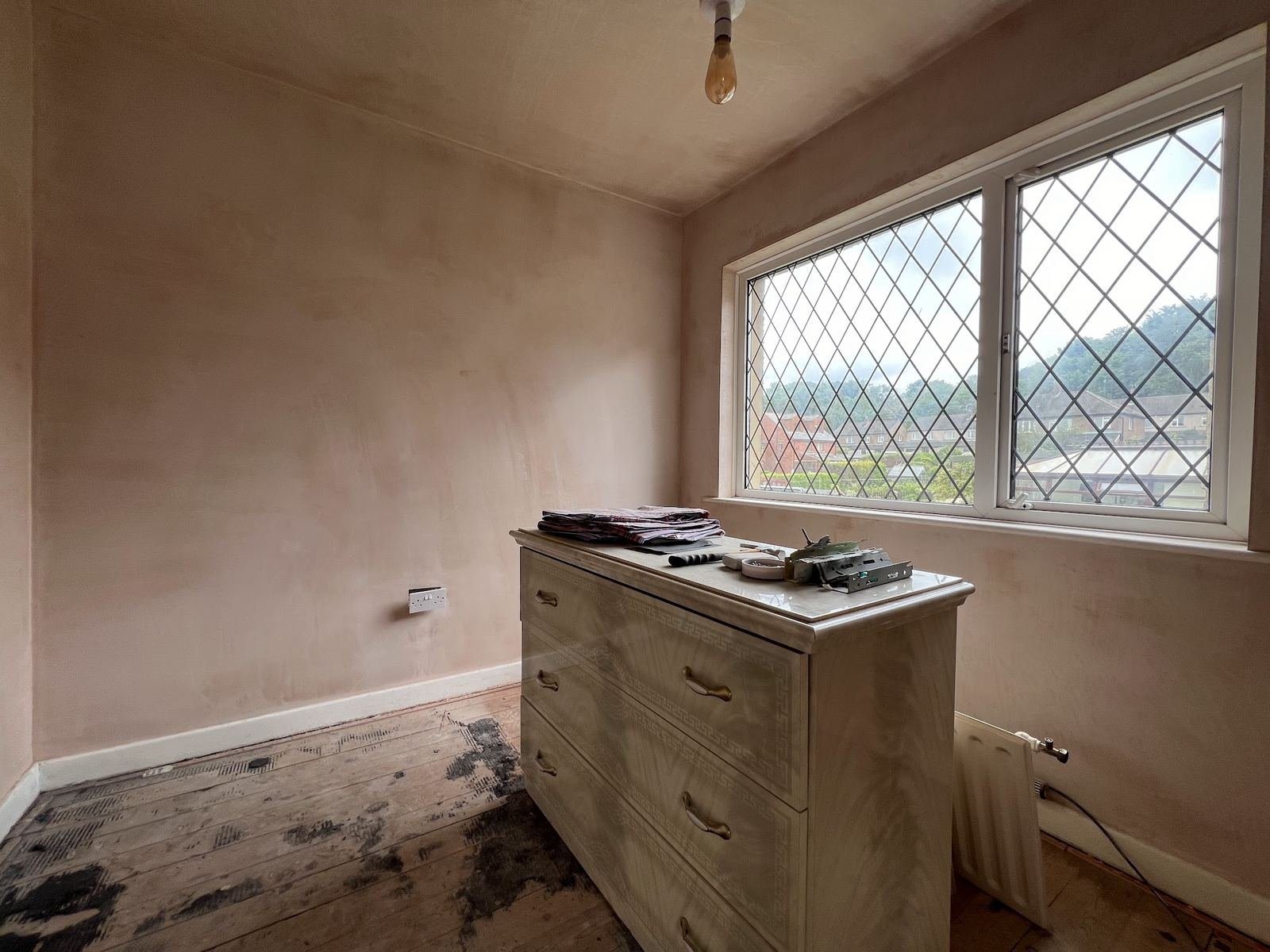 Bedroom freshly plastered with bay window
