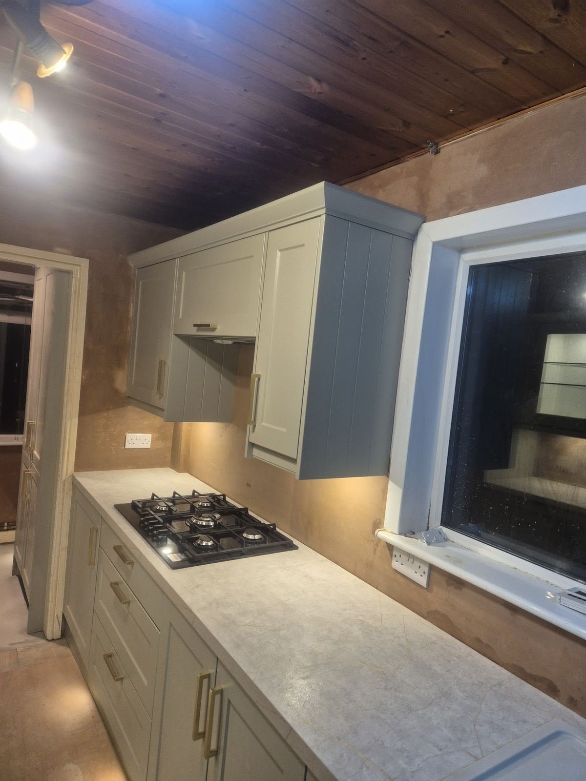 Kitchen walls skimmed around fitted units